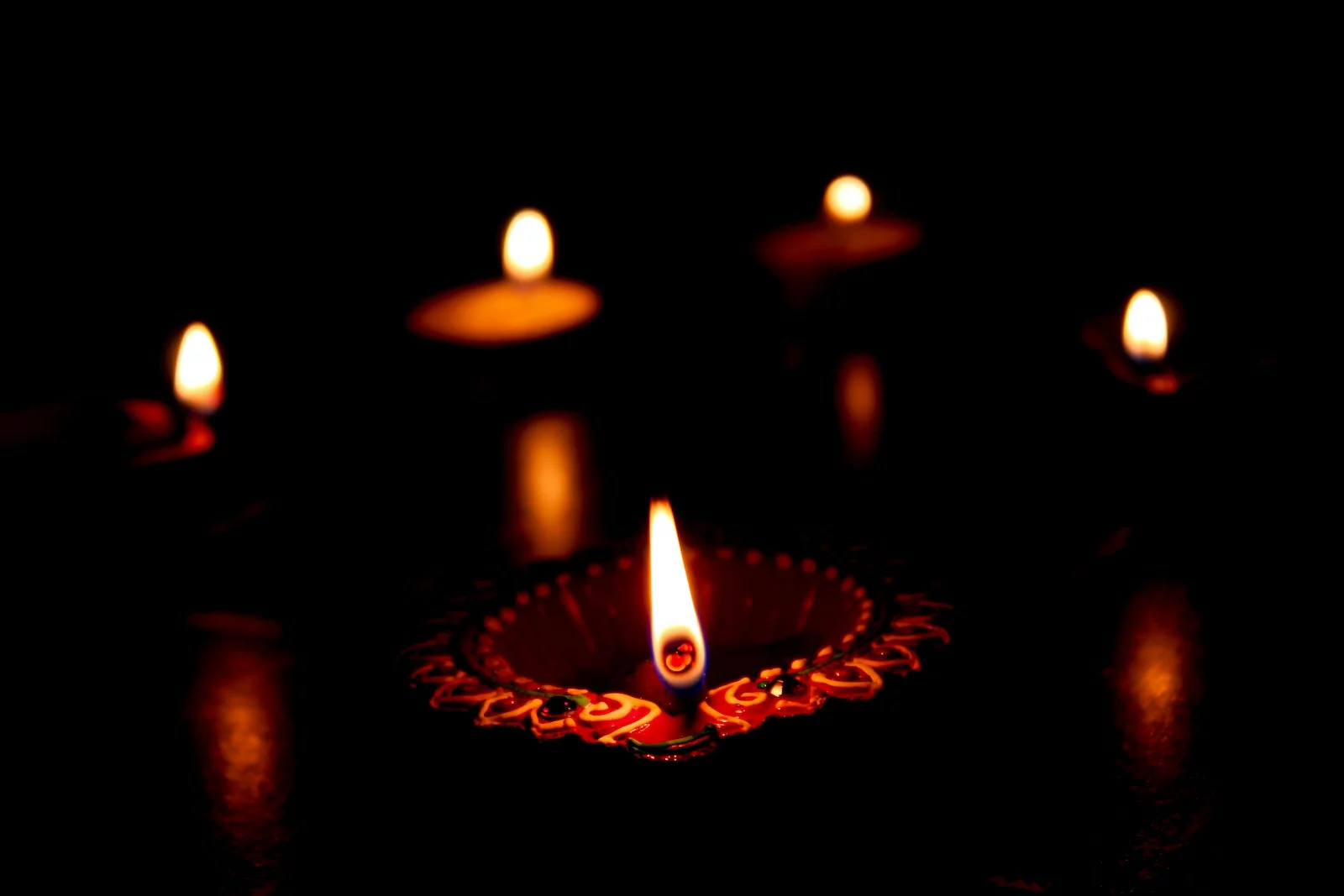 Lighted Candles on Dark Background