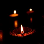 Lighted Candles on Dark Background